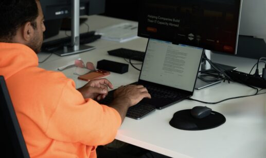 Developer at a workstation, developer salary Poland vs USA benchmarks